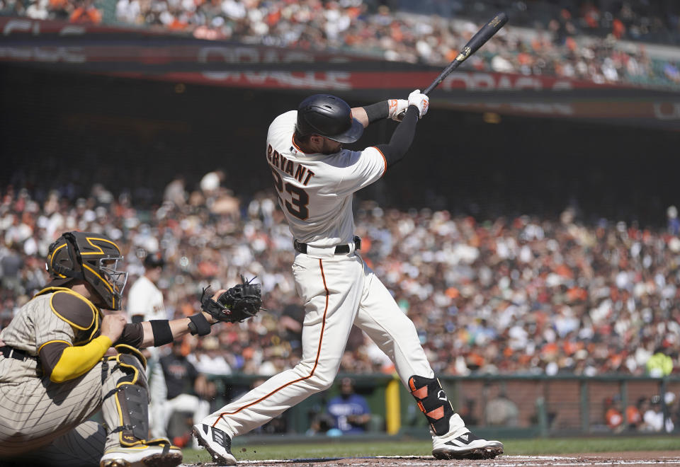 SAN FRANCISCO, CALIFORNIA - OCTOBER 02: Kris Bryant #23 of the San Francisco Giants hits an RBI single scoring Brandon Crawford #35 against the San Diego Padres in the bottom of the second inning at Oracle Park on October 02, 2021 in San Francisco, California. (Photo by Thearon W. Henderson/Getty Images)