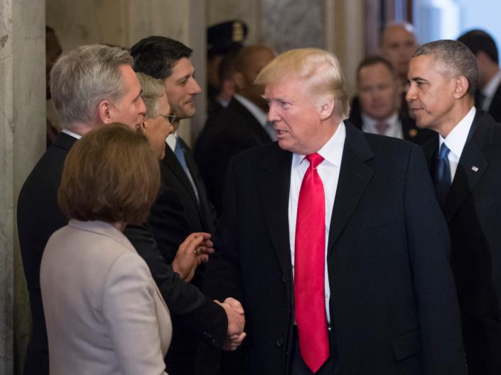 President-elect Donald Trump, followed by President Barack Obama, greets Congressional leadership as they arrive for Trump's inauguration ceremony on Capitol Hill in Washington, Friday, Jan. 20, 2017. From left are, House Minority Leader Nancy Pelosi of Calif., House Majority Leader Kevin McCarthy of Calif., Senate Majority Leader Mitch McConnell of Ky., and House Speaker Paul Ryan of Wis. (AP Photo/J. Scott Applewhite, Pool)