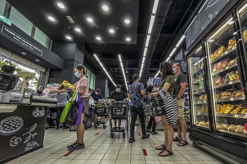 People shop for groceries at the Mercato Solaris supermarket in Mont Kiara June 7, 2021. — Picture by Hari Anggara