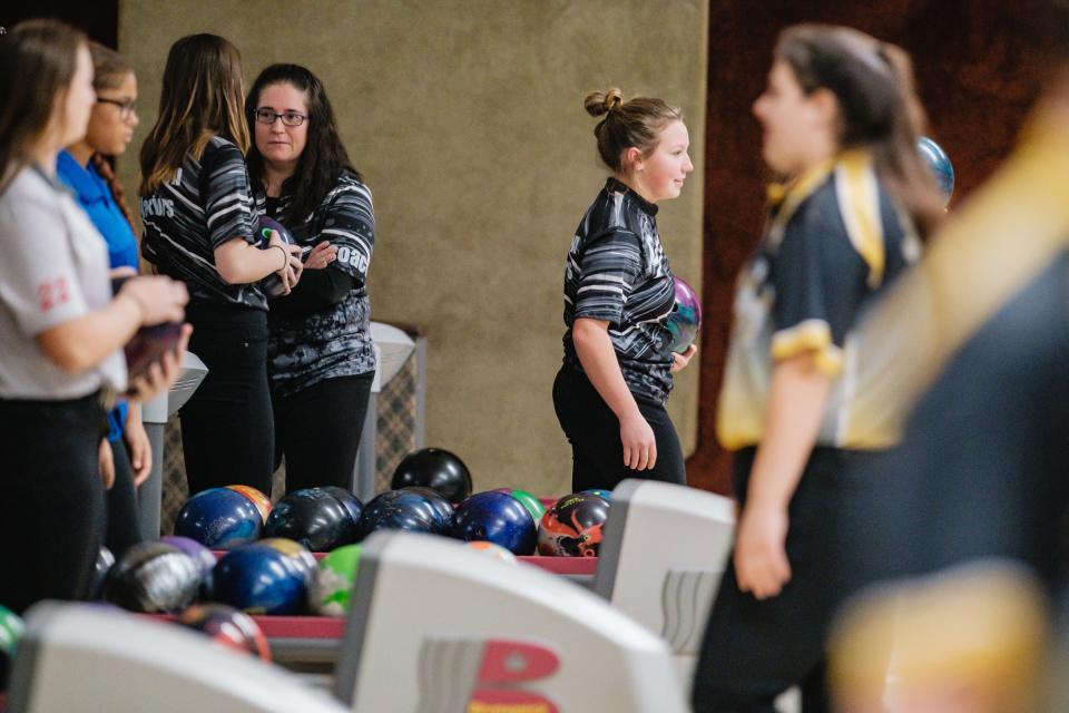 A bowler from Carrolton High School warms up during the Tuscarawas County Classic Saturday.