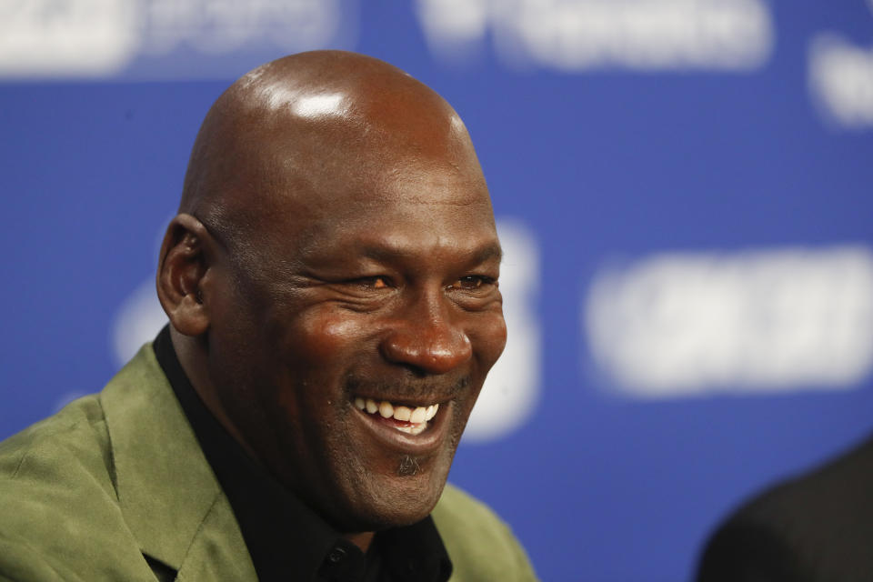 Former basketball superstar Michael Jordan speaks during a press conference ahead of NBA basketball game between Charlotte Hornets and Milwaukee Bucks in Paris, Friday, Jan. 24, 2020. (AP Photo/Thibault Camus))