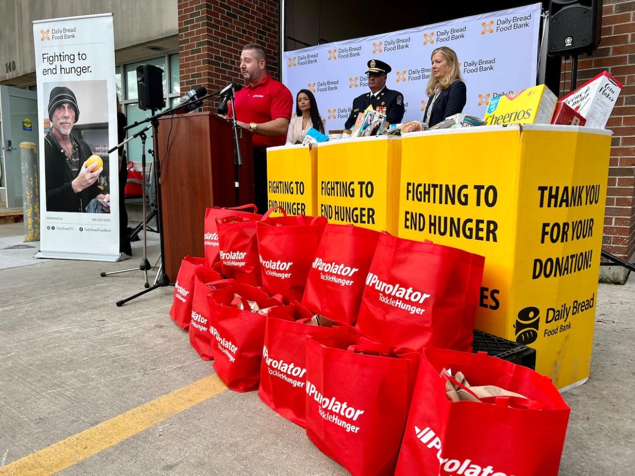 Puralator will distribute red bags throughout the GTA for non-perishable donations on Saturday. They will be picked up Sep. 30 and brought to Daily Bread food banks as part of the Thanksgiving drive. (Mark Bochsler/CBC - image credit)