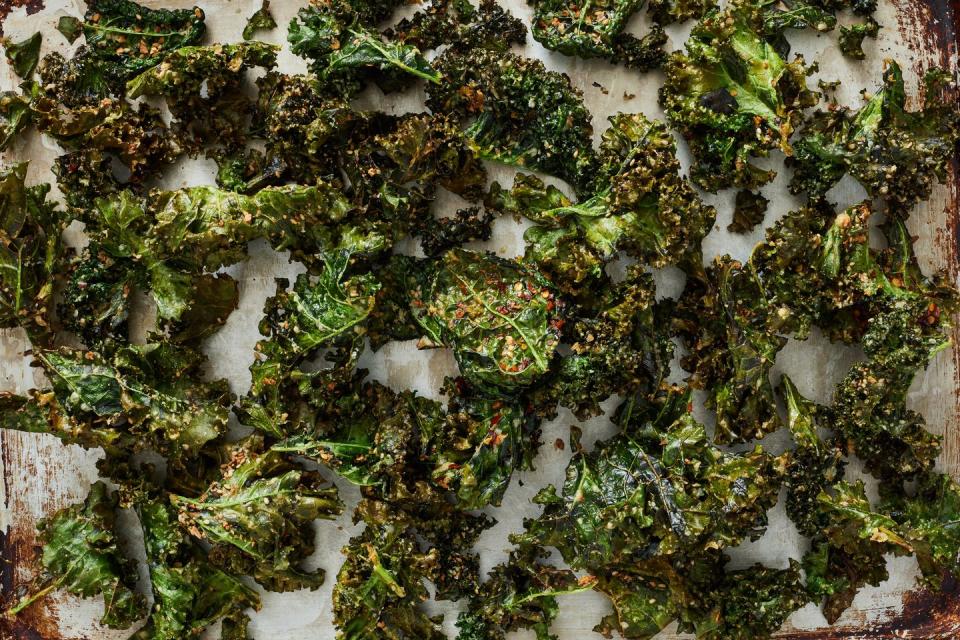 <p>These air fryer kale chips are a super tasty way to start a healthy chip habit. They take just minutes to prepare, and making them in your <a href="https://www.delish.com/cooking/g4711/air-fryer-recipes/" rel="nofollow noopener" target="_blank" data-ylk="slk:air fryer;elm:context_link;itc:0;sec:content-canvas" class="link ">air fryer</a> means way less grease. Feel free to customize your chips with different herbs and spices—the possibilities really are endless.</p><p>Get the <strong><a href="https://www.delish.com/cooking/recipe-ideas/a38760234/air-fryer-kale-chips-recipe/" rel="nofollow noopener" target="_blank" data-ylk="slk:Air Fryer Kale Chips recipe;elm:context_link;itc:0;sec:content-canvas" class="link ">Air Fryer Kale Chips recipe</a>.</strong></p>