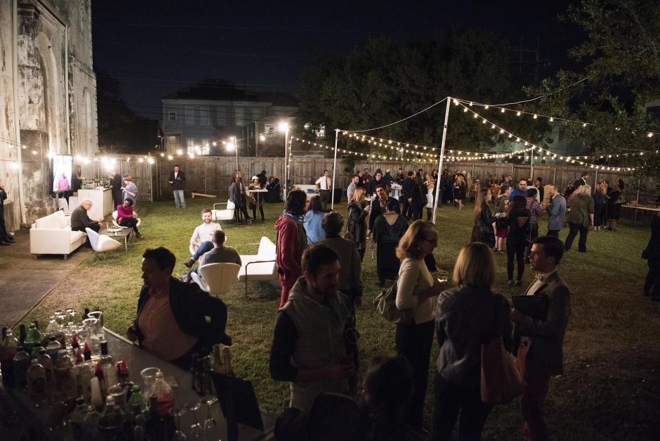 Guests mingle&nbsp;in the garden of Marigny Opera House.