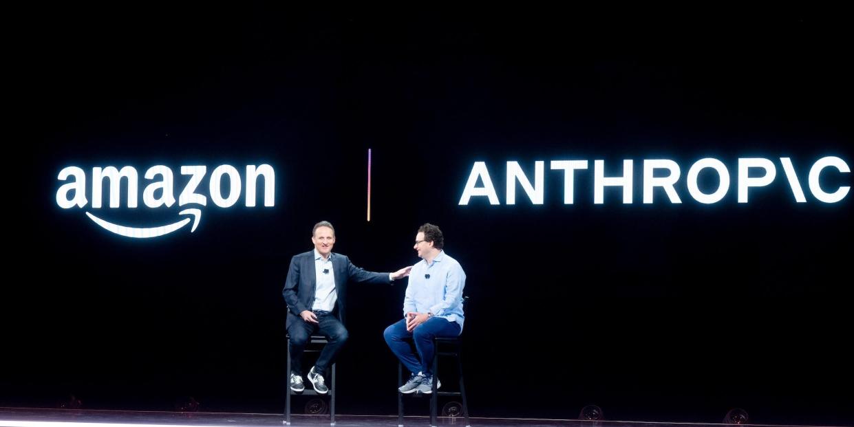 Amazon Web Services (AWS) CEO Adam Selipsky speaks with Anthropic CEO and co-founder Dario Amodei during a 2023 conference.