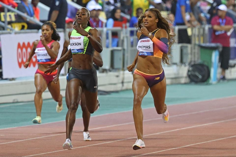 Gabby Thomas and Shericka Jackson compete in the women’s 200m at the Doha Diamond League last week (AFP via Getty Images)