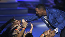 Actor Will Smith accepts the choice summer movie award for an action or adventure, for the film "Hancock," at the Teen Choice Awards in Universal City, Calif. on Sunday, Aug. 3, 2008. (AP Photo/ Chris Carlson)