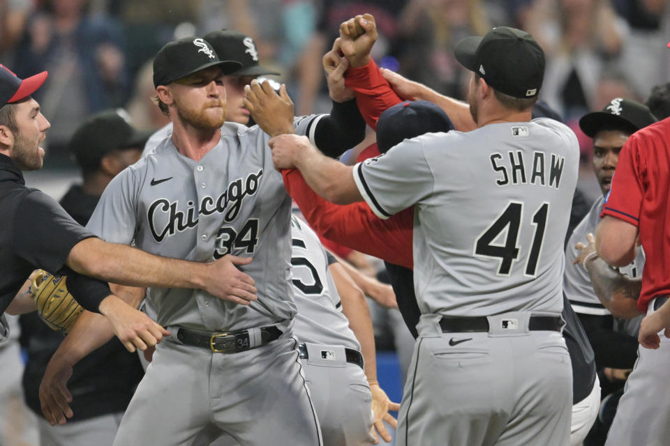 Aug 5, 2023; Cleveland, Ohio, USA; Chicago White Sox starting pitcher Michael Kopech (34) and Cleveland Guardians relief pitcher Emmanuel Clase (48) fight as White Sox relief pitcher <a class="link " href="https://sports.yahoo.com/mlb/players/8962" data-i13n="sec:content-canvas;subsec:anchor_text;elm:context_link" data-ylk="slk:Bryan Shaw;sec:content-canvas;subsec:anchor_text;elm:context_link;itc:0">Bryan Shaw</a> (41) tries to stop it during the sixth inning at Progressive Field. Mandatory Credit: Ken Blaze-USA TODAY Sports