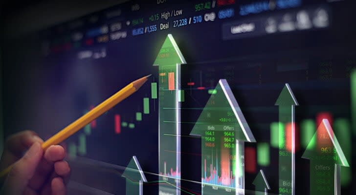 A hand holding a pencil pointing to a series of arrows on a stock chart, indicating value stocks. overlooked stocks with 10X potential