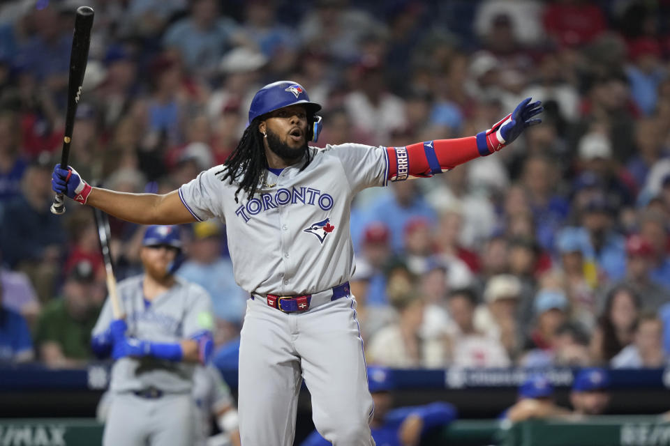 Toronto Blue Jays' Vladimir Guerrero Jr. reacts after a check swing against Philadelphia Phillies pitcher Spencer Turnbull during the eighth inning of a baseball game, Tuesday, May 7, 2024, in Philadelphia. (AP Photo/Matt Slocum)