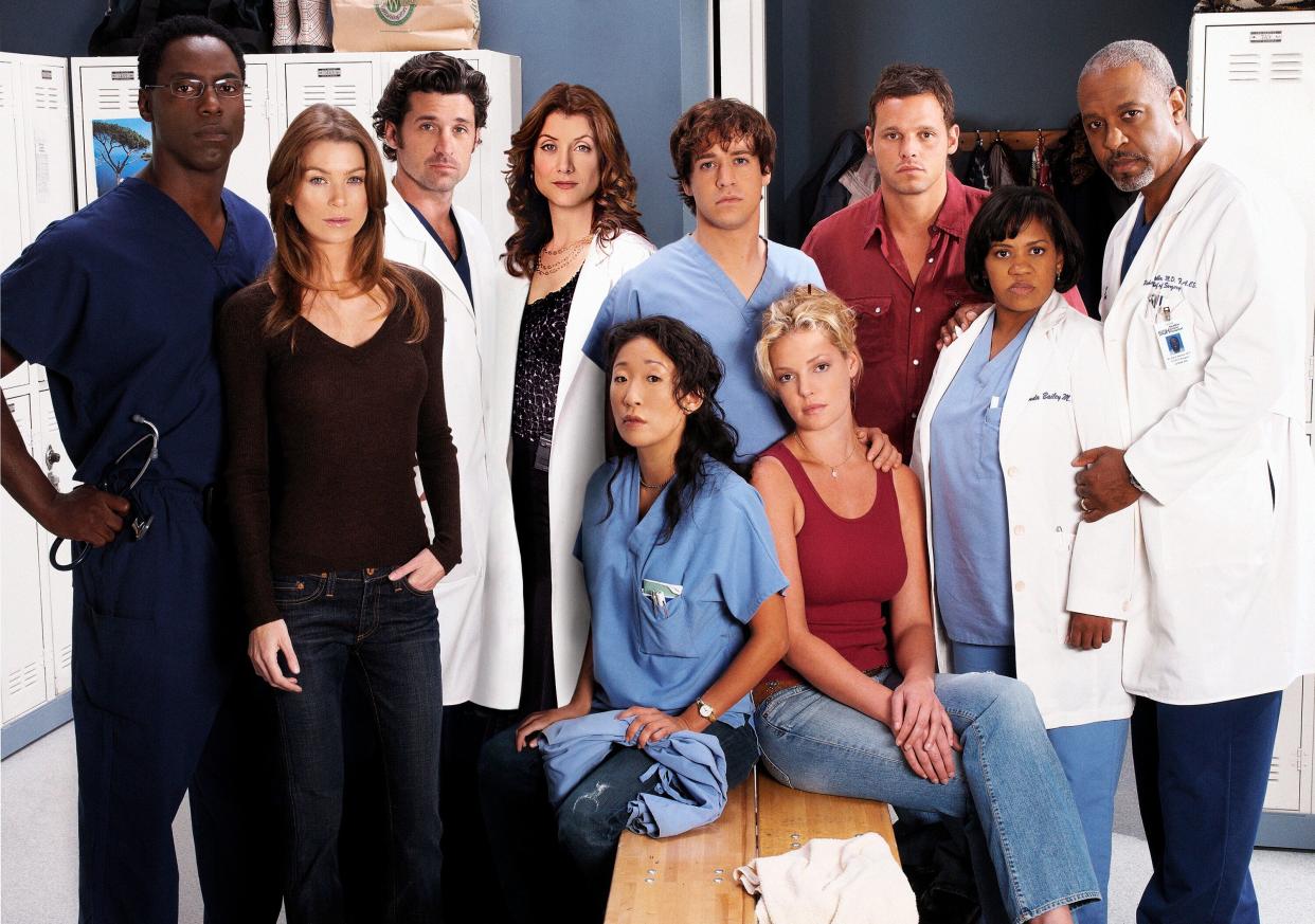 The original cast of "Grey's Anatomy." Standing: Isaiah Washington, Ellen Pompeo, Patrick Dempsey, Kate Walsh, T.R. Knight, Justin Chambers, Chandra Wilson, James Pickens Jr. Sitting: Sandra Oh and Katherine Heigl. (Photo: Frank Ockenfels via Getty Images)