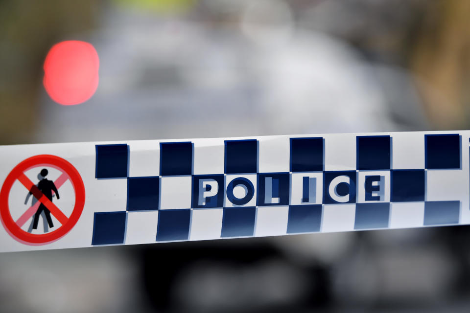 File pic of police tape. Police have found a man dead in a parked car at a Deer Park shopping centre in Melbourne.