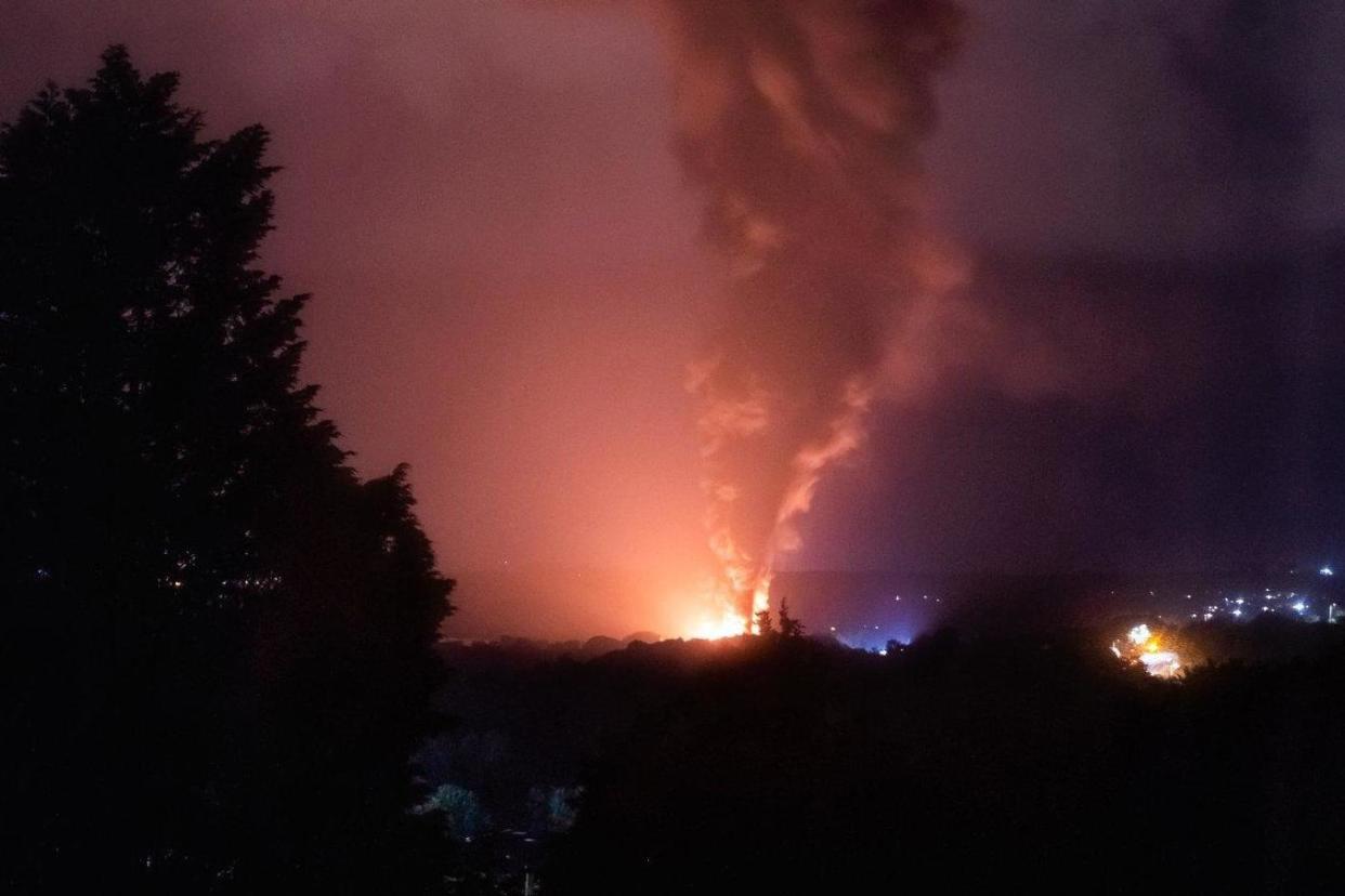 Smoke billows near Llangennech after a large diesel train caught fire in south Wales