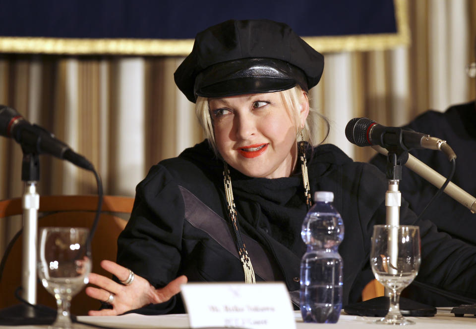 Cyndi Lauper speaks during her press conference on her experience with the March 11 earthquake and tsunami at the Foreign Correspondents' Club of Japan in Tokyo Monday, March 12, 2012. Lauper, who is admired here as a true star who didn't run away despite the tsunami and nuclear crisis last year, is back, to show that she hasn't forgotten. "It's a big tragedy but everybody is trying to move forward. I just want to say hey don't forget about Japan," Lauper told a news conference in Tokyo. (AP Photo/Junji Kurokawa)