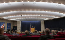 DELETES REFERENCE TO LAW ENFORCEMENT OFFICIALS - Attendee sit apart while listening to U.S. Attorney General William Barr speak at the Gerald R. Ford Presidential Museum in Grand Rapids, Mich., Thursday, July 16, 2020. (Nicole Hester/Mlive.com/Ann Arbor News via AP)