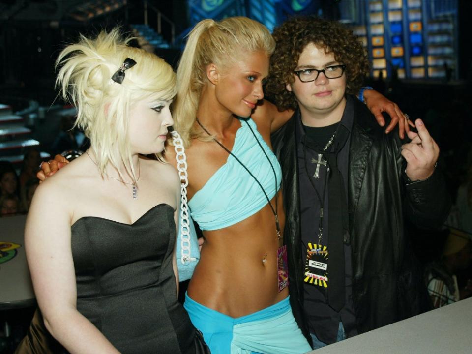 ‘Fame is torturous’: Kelly and Jack Osbourne pose with Paris Hilton at the 2003 MTV Movie Awards (Getty)