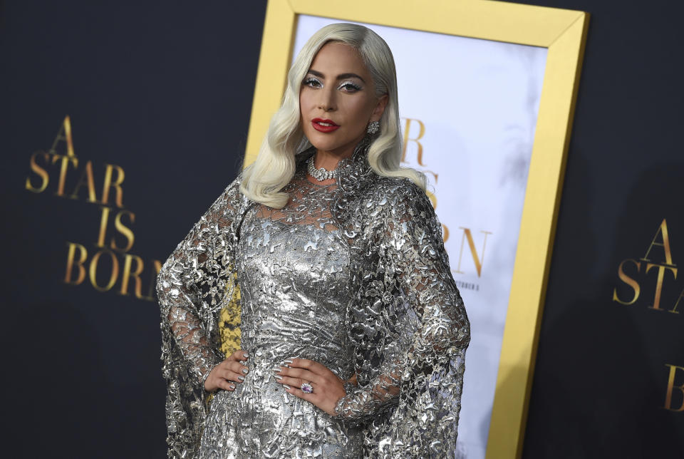 FILE - In this Sept. 24, 2018 file photo, Lady Gaga arrives at the Los Angeles premiere of "A Star Is Born," at the Shrine Auditorium. A list of nominees in the top categories at the 2019 Grammys, including Kendrick Lamar, who is the leader with eight nominations, were announced Friday, Dec. 7, 2018, by the Recording Academy. Drake, Cardi B, Brandi Carlile, Childish Gambino, H.E.R., Lady Gaga, Maren Morris, SZA, Kacey Musgraves and Greta Van Fleet also scored multiple nominations. (Photo by Jordan Strauss/Invision/AP)