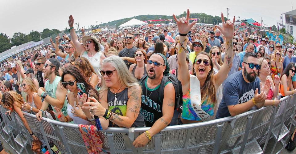 Fans cheer on the Elovaters band at the Levitate Music Festival in Marshfield on Sunday, Aug. 8, 2021.