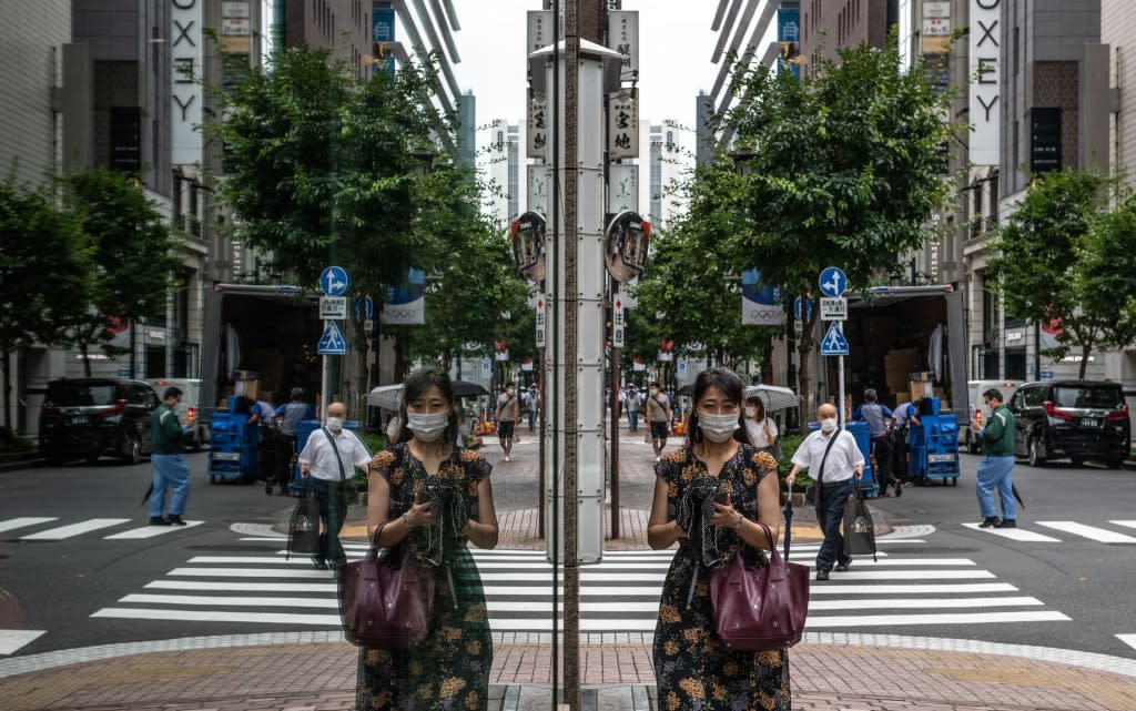 "I would hazard an unscientific guess that perhaps 99 per cent of people in Tokyo wear face masks all the time outside home at the moment" - getty