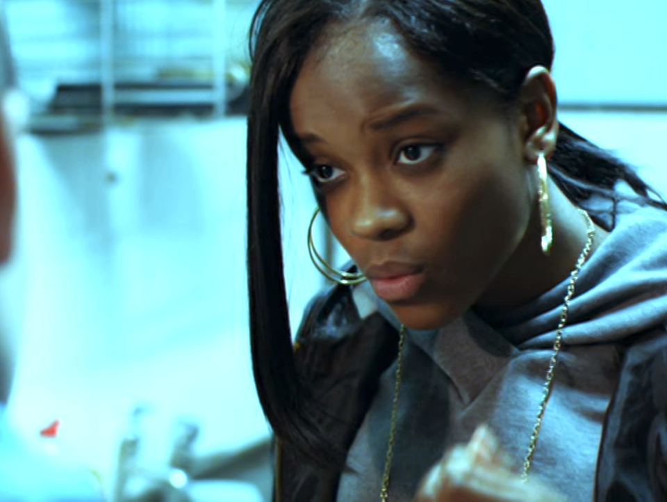 Close-up of Letitia with hoop earrings