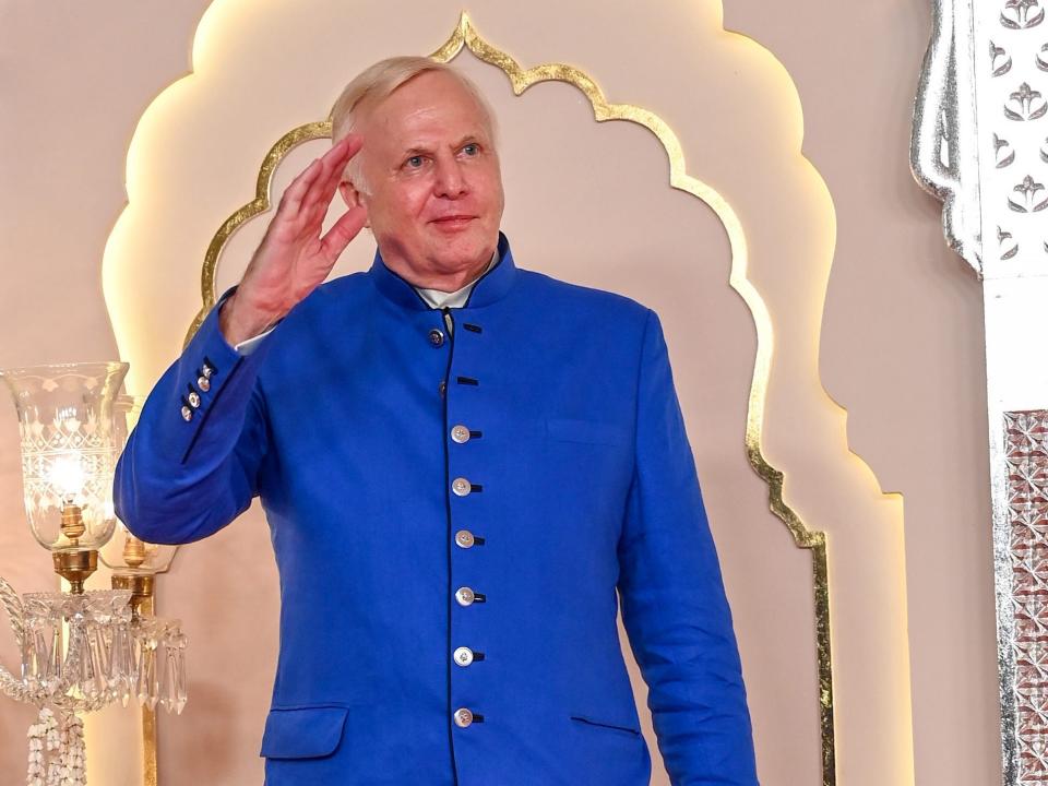 American businessman Bob Dudley poses for photos at Ambani's wedding