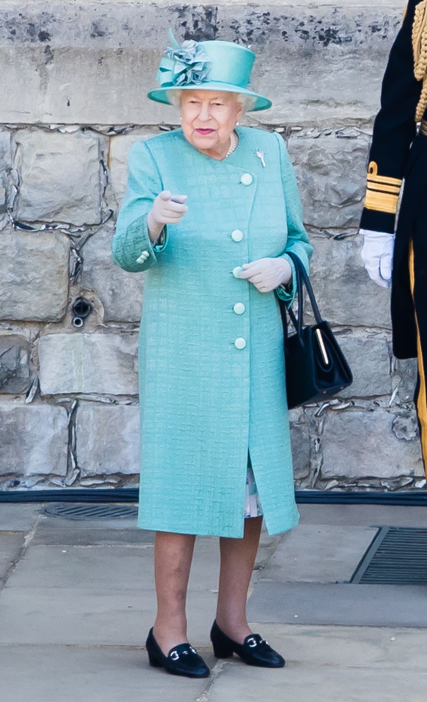 The queen inspects members of The Welsh Guards.