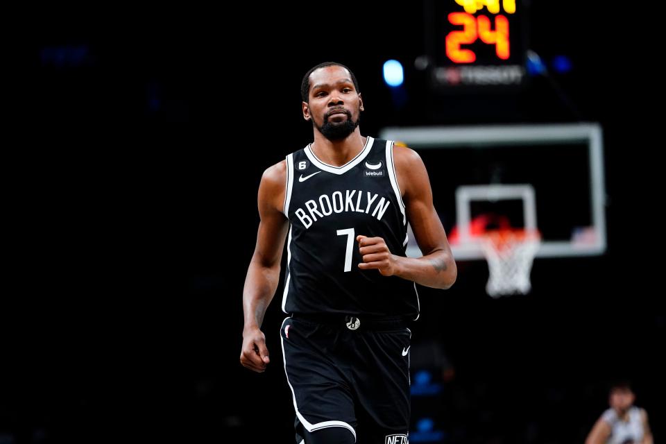 Brooklyn Nets' Kevin Durant (7) runs on the court during the first half of an NBA basketball game against the Golden State Warriors Wednesday, Dec. 21, 2022 in New York. (AP Photo/Frank Franklin II)