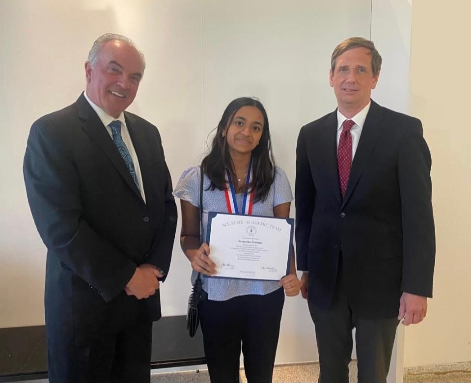 Raritan Valley Community College student Sangeetha Punnam of Bridgewater (center) was joined by RVCC President Michael J. McDonough, (left) and NJCCC President Aaron Fichtner, Ph.D., at the New Jersey Community College Scholars Celebration, held Thursday, April 28, at the New Jersey State Museum in Trenton.