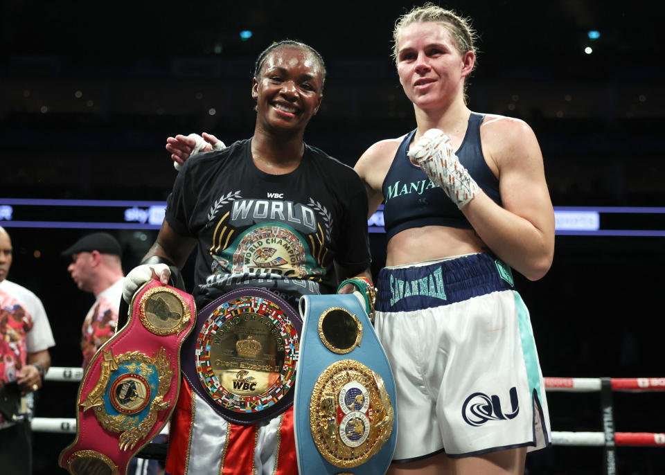 LONDON, ENGLAND - OCTOBER 15: Claressa Shields (L) and Savannah Marshall (R) pose after their undisputed middleweight championship fight at The 02 Arena on October 15, 2022 in London, England. (Photo by Mark Robinson/Top Rank Inc via Getty Images)