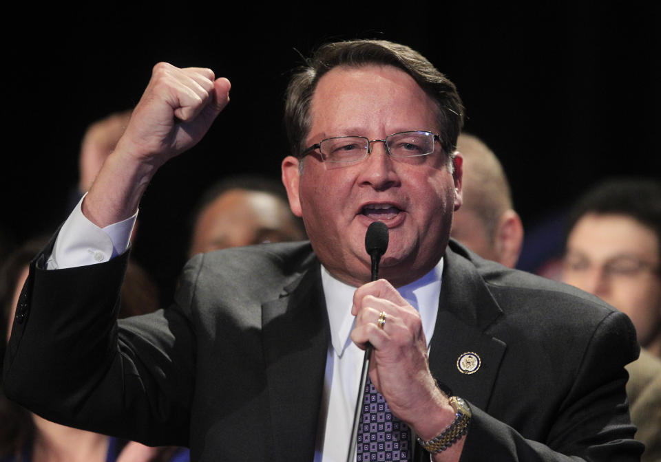 FILE - In this Nov. 6, 2012 file photo, Rep. Gary Peters, D-Mich., addresses supporters in Detroit. Peters planned to put Republican Terri Land on the defensive Monday, March 3, 2014 in their U.S. Senate race by highlighting her 2012 opposition to the federal bailout of General Motors and Chrysler, which is widely credited with saving the U.S. auto industry. (AP Photo/Carlos Osorio, File)