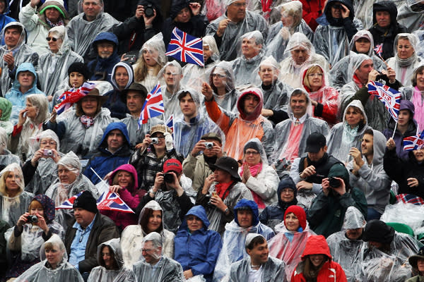 <div class="caption-credit"> Photo by: Dan Kitwood | Getty Images</div>Revelers line the route during the Diamond Jubilee River Pageant on June 3, 2012 in London, England.Thousands of well-wishers from around the world have flocked to London to witness the spectacle of the weekend's celebrations.