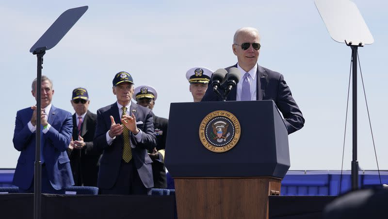 President Joe Biden approaches the podium to speak during a commissioning ceremony for USS Delaware, a Virginia-class fast-attack submarine, at the Port of Wilmington in Wilmington, Delaware, Saturday, April 2, 2022. 
