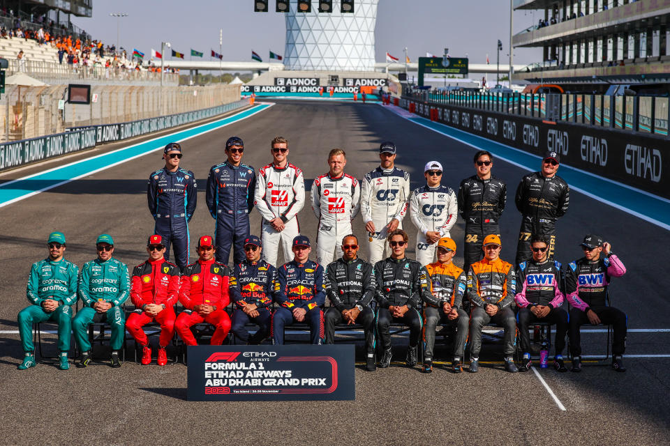 The 2023 F1 drivers pose on the grid for the end of year photo during the 2023 F1 Grand Prix of Abu Dhabi.