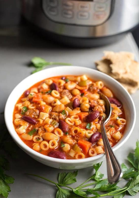 Simply Happy Foodie<p>This delicious pasta soup with beans and sausage is the perfect Italian-style meal that you can make in the Instant Pot!</p><p><strong>Get the recipe: <a href="https://www.simplyhappyfoodie.com/instant-pot-pasta-e-fagioli/" rel="sponsored" target="_blank" data-ylk="slk:Copycat Olive Garden Pasta e Fagioli;elm:context_link;itc:0;sec:content-canvas" class="link ">Copycat Olive Garden Pasta e Fagioli</a></strong></p>