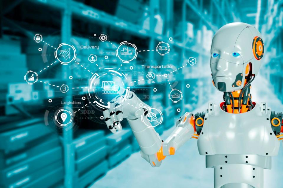 PHOTO: AI technology humanoid robot touch screen UI technology AI interface future warehouse export and import future robot technology in this undated stock photo. (STOCK PHOTO/Getty Images)