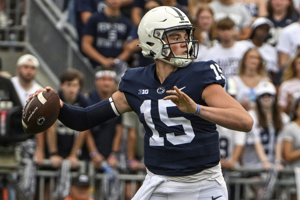 FILE - Penn State quarterback Drew Allar (15) looks to pass against Ohio during the second half of an NCAA college football game, Saturday, Sept. 10, 2022, in State College, Pa. With a bounty of talent surrounding him and a favorable schedule, the stage is set for Allar to make the Nittany Lions a College Football Playoff challenger. (AP Photo/Barry Reeger, File)