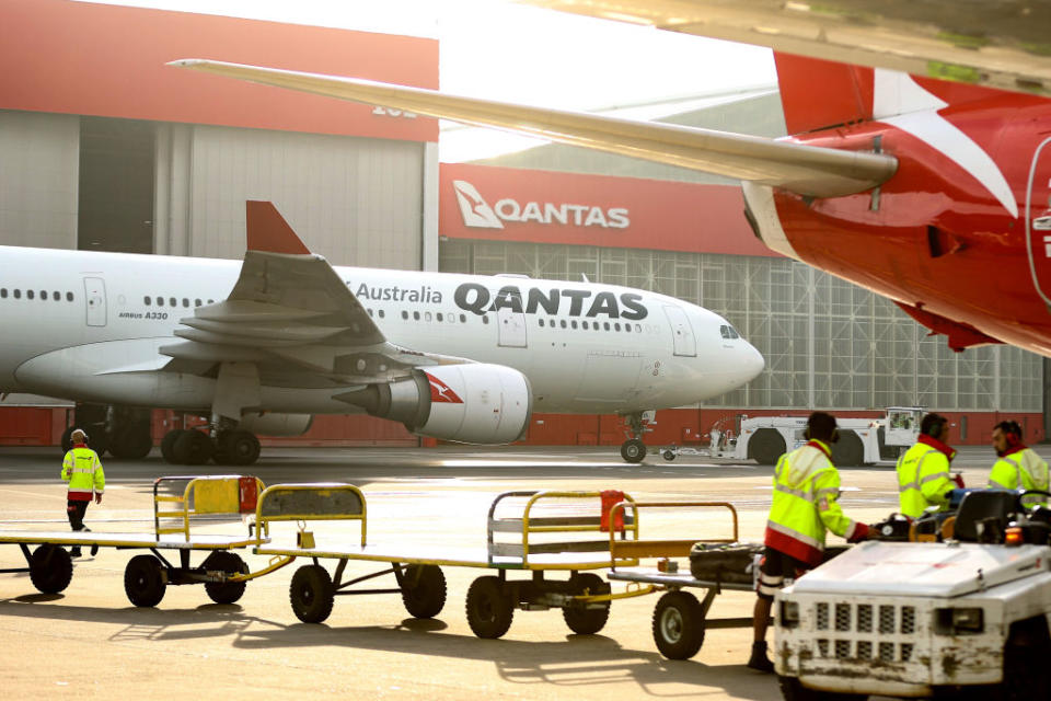 An aircraft operated by Qantas Airways taxis on the tarmac at Sydney Airport in Sydney, Australia, on Wednesday, June 23, 2021. (Photographer: Brendon Thorne/Bloomberg)