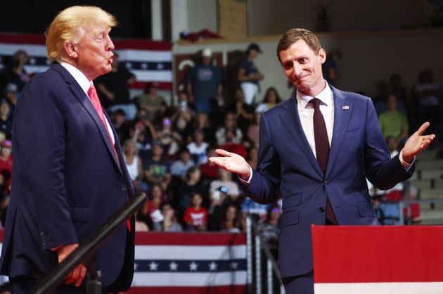 Former President Donald Trump (left) stands with Republican Senate candidate Blake Masters at a 