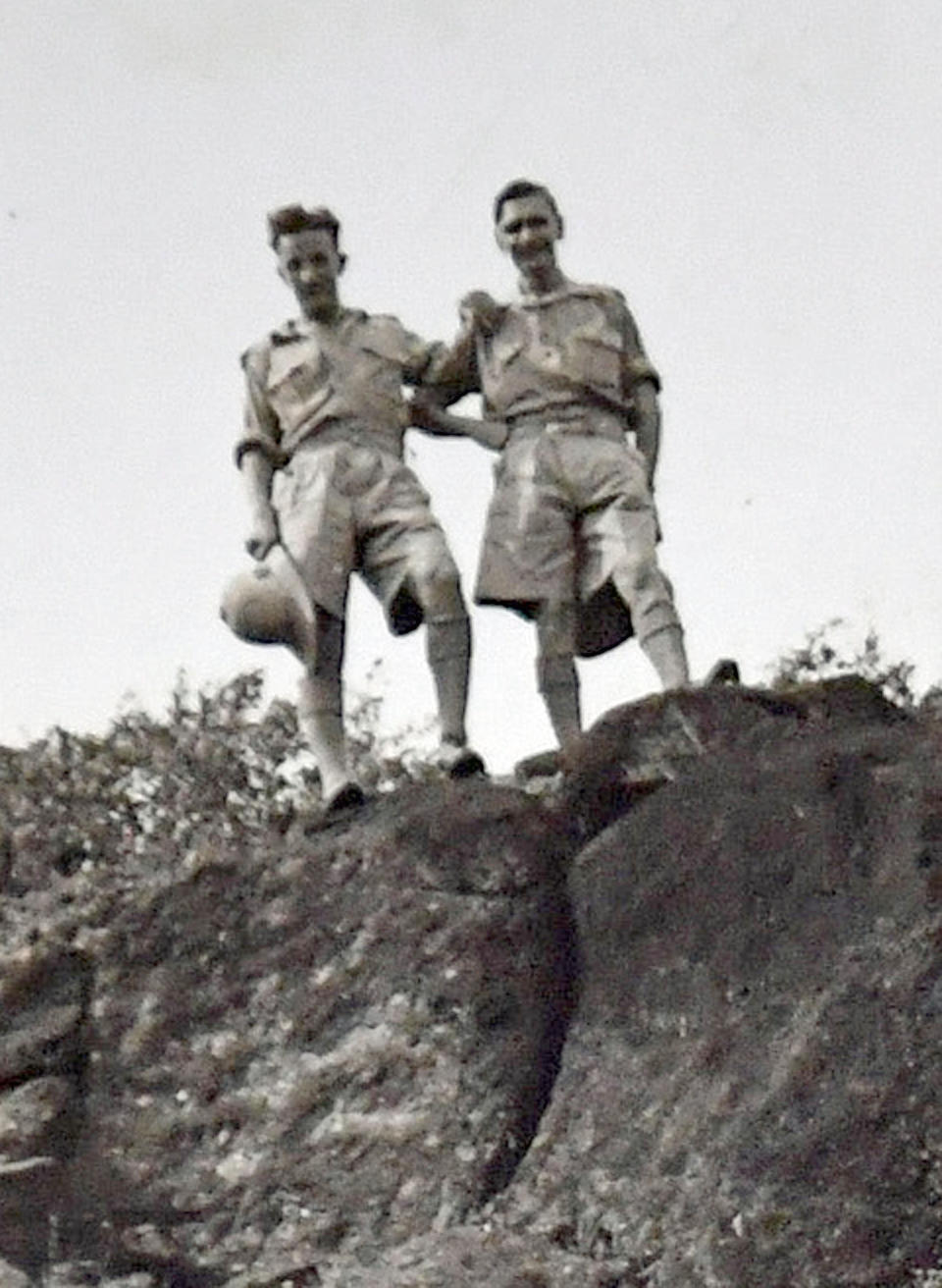 John Cox (left) during his time in the army. (PA Images)