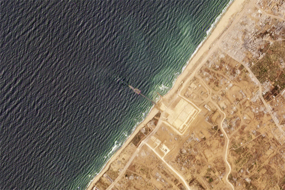 This satellite image from Planet Labs PBC shows a pier installed by the U.S. military in the Gaza Strip on Thursday, May 16, 2024. (Planet Labs PBC via AP)