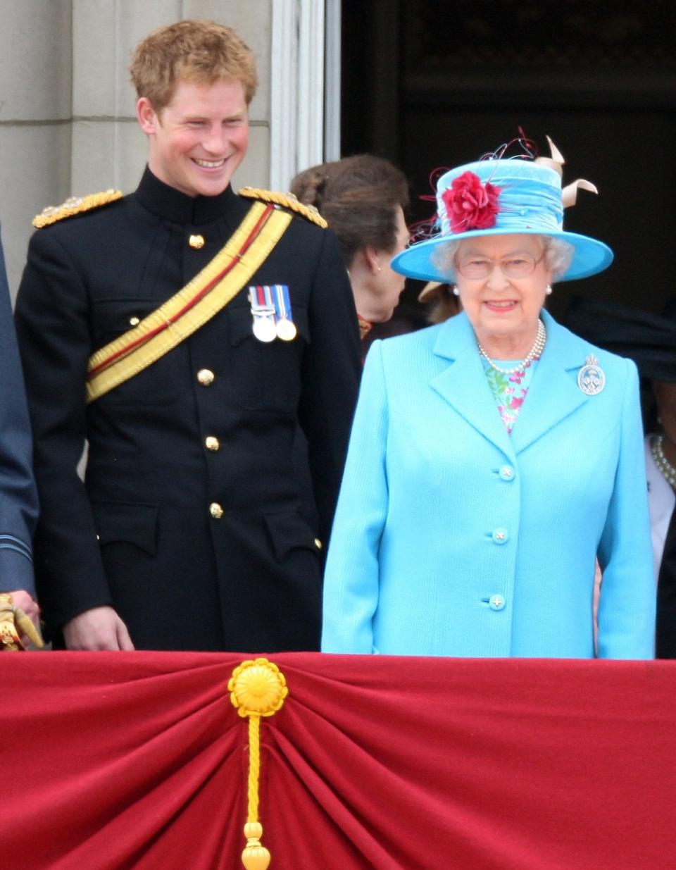 Harry and the Queen share a smile at the same ceremony in 2009. 