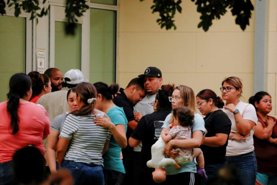 <div class="inline-image__caption"> <p>Parents mass outside the civic center, hoping to be reunited with their children. </p> </div> <div class="inline-image__credit"> Marco Bello/Reuters </div>