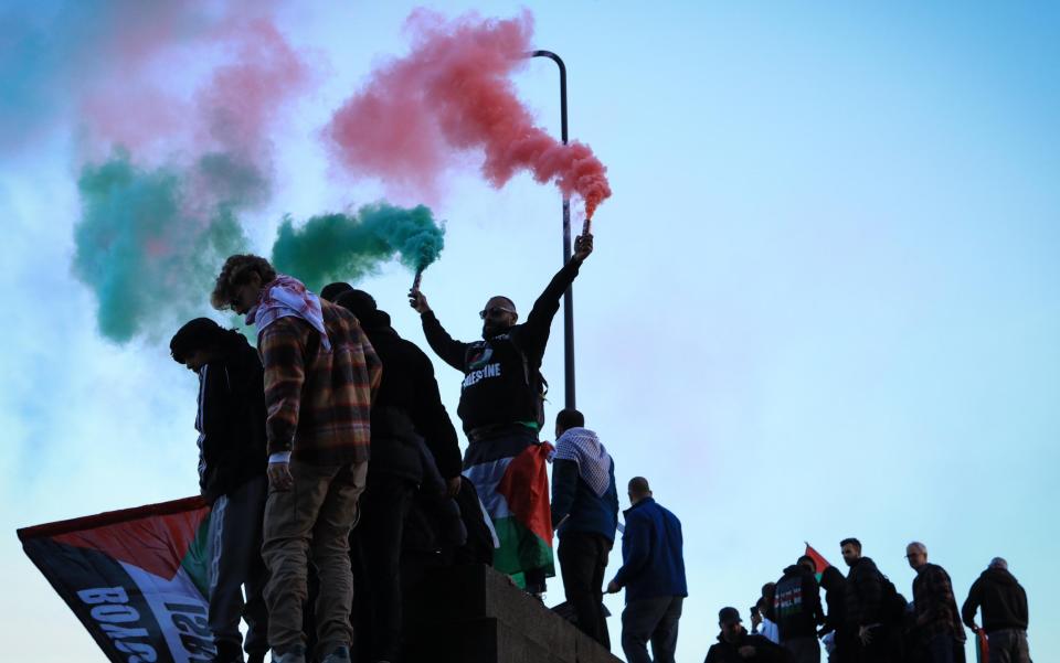 People march on Vauxhall bridge during a pro-Palestinian rally on Armistice Day