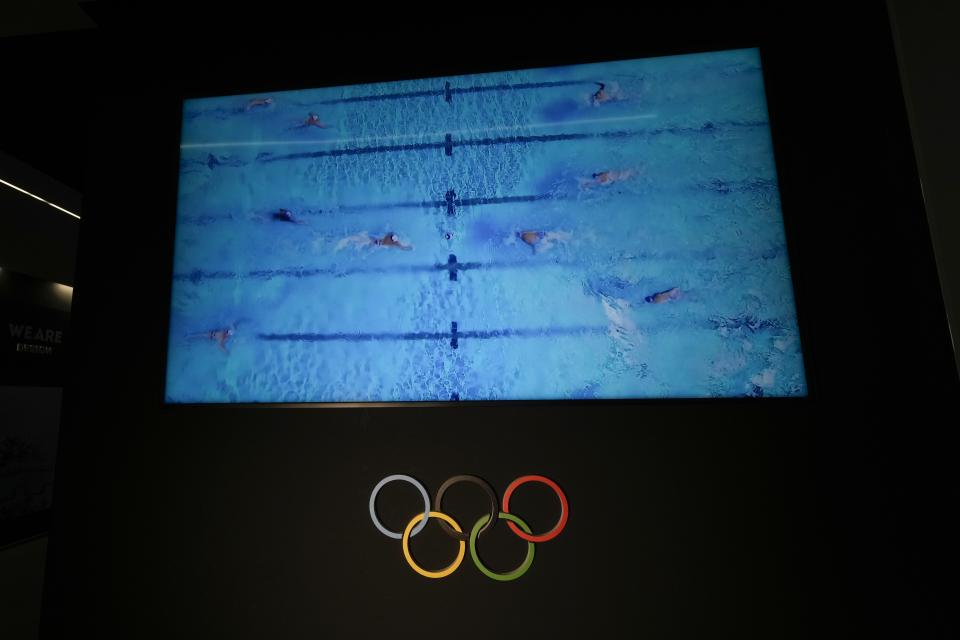 A monitor displays athletes on an Olympic pool at the Myrtha Pools factory, in Castiglione delle Stiviere, northern Italy, Tuesday, March 12, 2024. Italian company Myrtha Pools is producing 24 pools for the Paris Olympics at its factory in Castiglione delle Stiviere, near Verona. The pools will be used for swimming, diving, water polo, artistic swimming and training areas in Paris. It's the sixth Olympics that Myrtha will be providing pools for. (AP Photo/Luca Bruno)