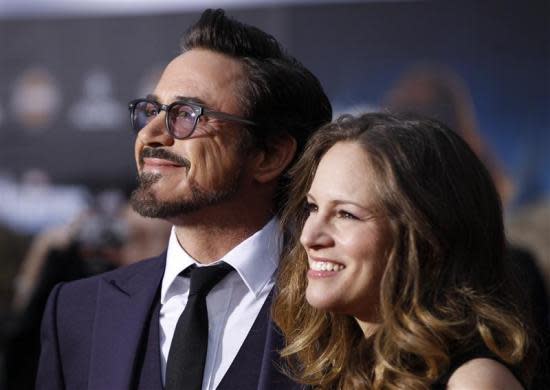 Robert Downey Jr. and his wife Susan Downey pose at the world premiere of the film "Marvel's The Avengers" in Hollywood, April 11, 2012.