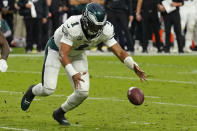 Philadelphia Eagles quarterback Jalen Hurts (1) fumbles the ball that was recovered by the Las Vegas Raiders during the second half of an NFL football game, Sunday, Oct. 24, 2021, in Las Vegas. (AP Photo/Rick Scuteri)