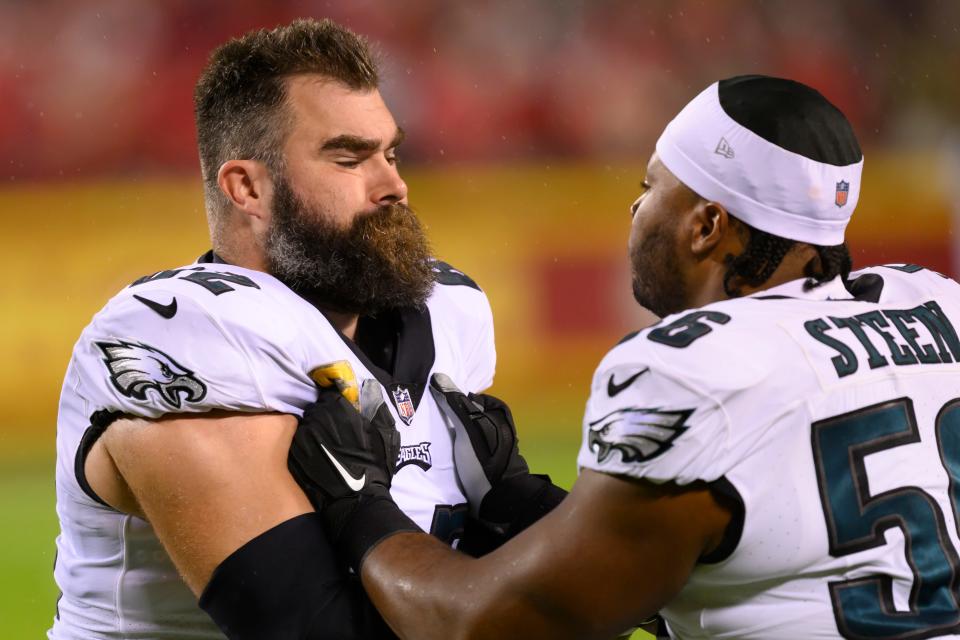 Philadelphia Eagles center Jason Kelce, left, warms up with Eagles guard Tyler Steen, right, before the first half of an NFL football game against the Kansas City Chiefs, Monday, Nov. 20, 2023 in Kansas City, Mo.