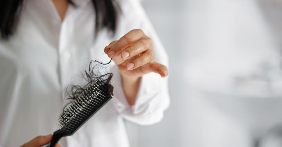 Hair tangled up in a hairbrush