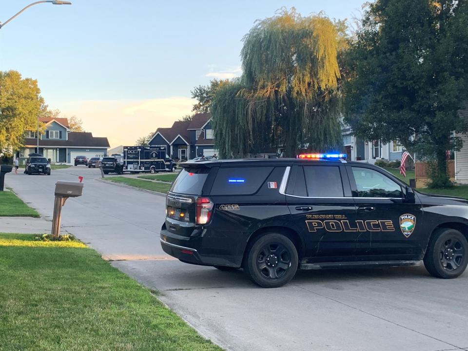 The 400 block of Pleasant Circle in Pleasant Hill is blocked off Saturday evening as an investigation continues into an incident resulting in a Pleasant Hill police officer shooting and killing a man earlier in the day.