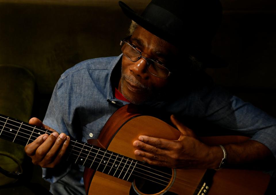 Peter One prepares backstage for his debut at the Grand Ole Opry in Nashville on April 14. One, who emigrated to the U.S. decades ago, has seen his music career revived after 30 years.